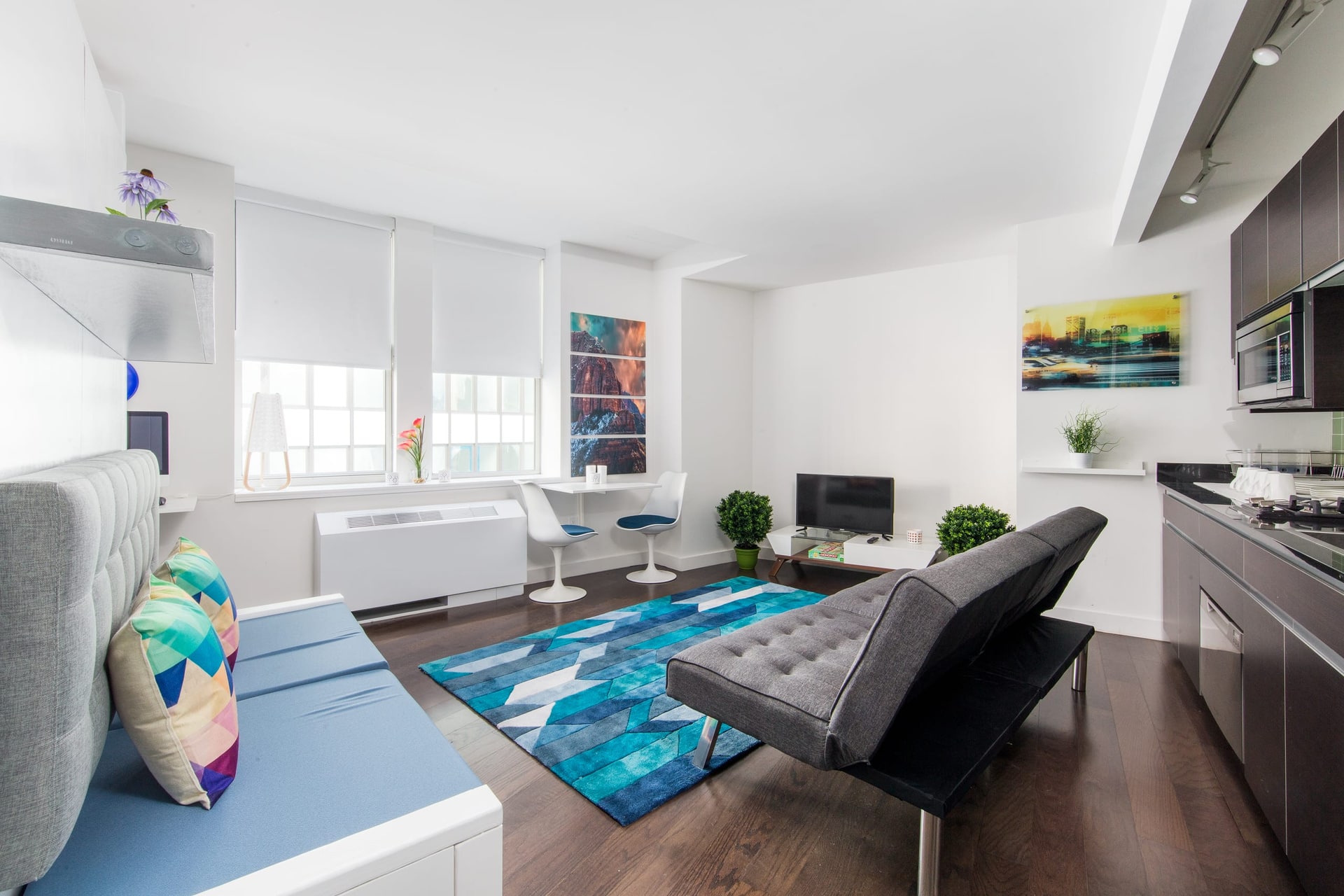 Open living and kitchen area at Seaport Studio.