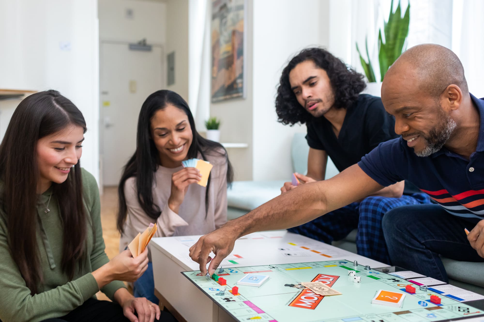 Members of the PermaGO network sharing an easy evening together in a real home.